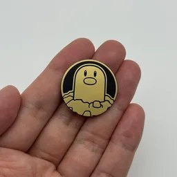 In hand, from Pokémon Coin Fan, full size