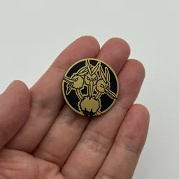 In hand, from Pokémon Coin Fan, full size