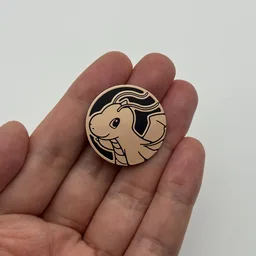 In hand, from Pokémon Coin Fan, full size