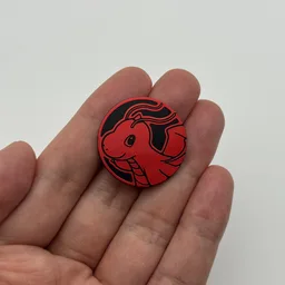 In hand, from Pokémon Coin Fan, full size
