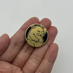 In hand, from Pokémon Coin Fan, full size