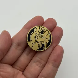In hand, from Pokémon Coin Fan, full size