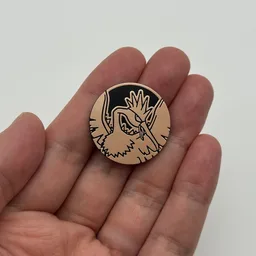 In hand, from Pokémon Coin Fan, full size