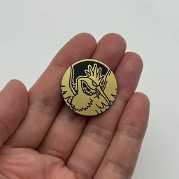 In hand, from Pokémon Coin Fan, full size