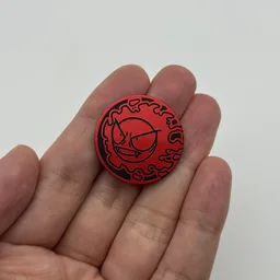 In hand, from Pokémon Coin Fan, full size