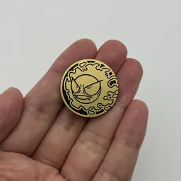 In hand, from Pokémon Coin Fan, full size