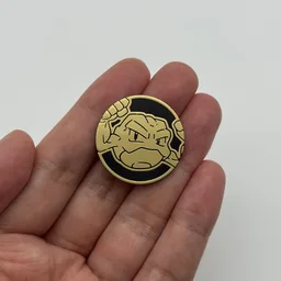 In hand, from Pokémon Coin Fan, full size