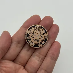 In hand, from Pokémon Coin Fan, full size