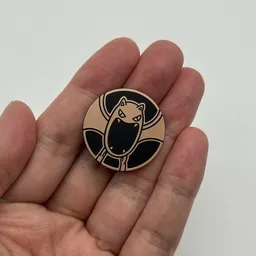 In hand, from Pokémon Coin Fan, full size
