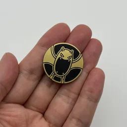 In hand, from Pokémon Coin Fan, full size