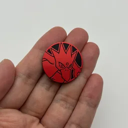 In hand, from Pokémon Coin Fan, full size