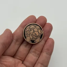 In hand, from Pokémon Coin Fan, full size