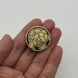 In hand, from Pokémon Coin Fan, full size