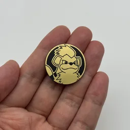 In hand, from Pokémon Coin Fan, full size