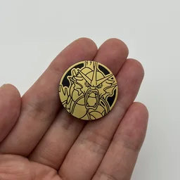 In hand, from Pokémon Coin Fan, full size