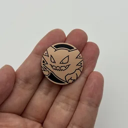 In hand, from Pokémon Coin Fan, full size