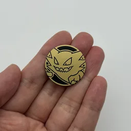 In hand, from Pokémon Coin Fan, full size