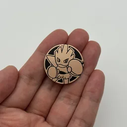 In hand, from Pokémon Coin Fan, full size