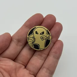 In hand, from Pokémon Coin Fan, full size