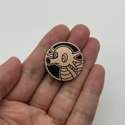 In hand, from Pokémon Coin Fan, full size