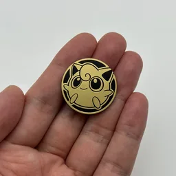In hand, from Pokémon Coin Fan, full size