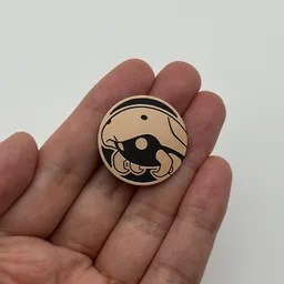 In hand, from Pokémon Coin Fan, full size