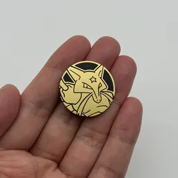 In hand, from Pokémon Coin Fan, full size