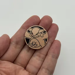 In hand, from Pokémon Coin Fan, full size
