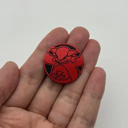 In hand, from Pokémon Coin Fan, full size