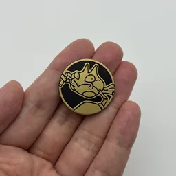 In hand, from Pokémon Coin Fan, full size