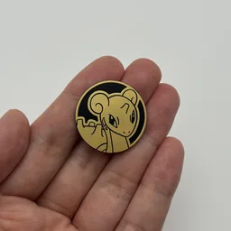 In hand, from Pokémon Coin Fan, full size