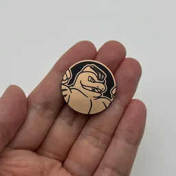 In hand, from Pokémon Coin Fan, full size