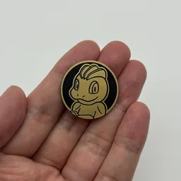 In hand, from Pokémon Coin Fan, full size