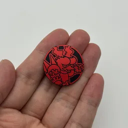 In hand, from Pokémon Coin Fan, full size