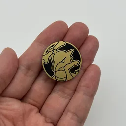 In hand, from Pokémon Coin Fan, full size