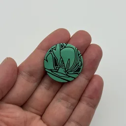 In hand, from Pokémon Coin Fan, full size