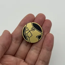 In hand, from Pokémon Coin Fan, full size