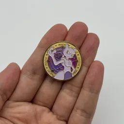 In hand, from Pokémon Coin Fan, full size