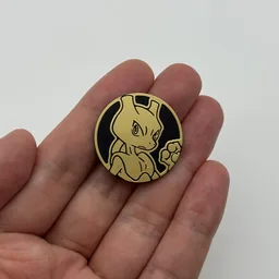 In hand, from Pokémon Coin Fan, full size