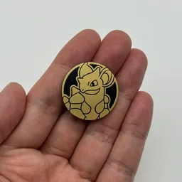 In hand, from Pokémon Coin Fan, full size
