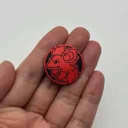 In hand, from Pokémon Coin Fan, full size