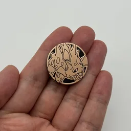 In hand, from Pokémon Coin Fan, full size