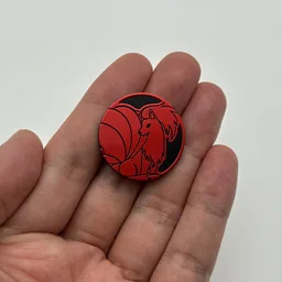 In hand, from Pokémon Coin Fan, full size
