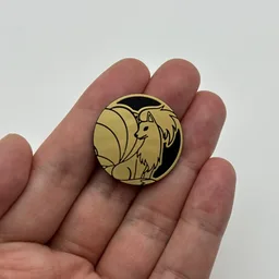 In hand, from Pokémon Coin Fan, full size