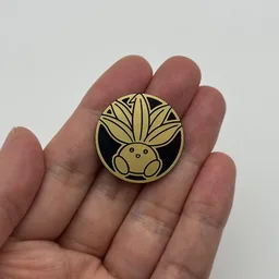 In hand, from Pokémon Coin Fan, full size