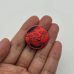 In hand, from Pokémon Coin Fan, full size