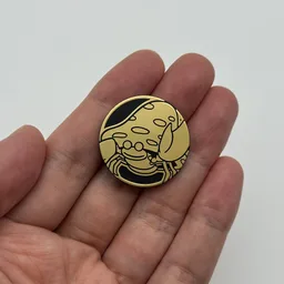 In hand, from Pokémon Coin Fan, full size