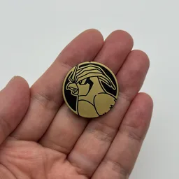 In hand, from Pokémon Coin Fan, full size