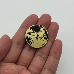 In hand, from Pokémon Coin Fan, full size