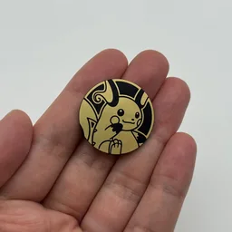 In hand, from Pokémon Coin Fan, full size